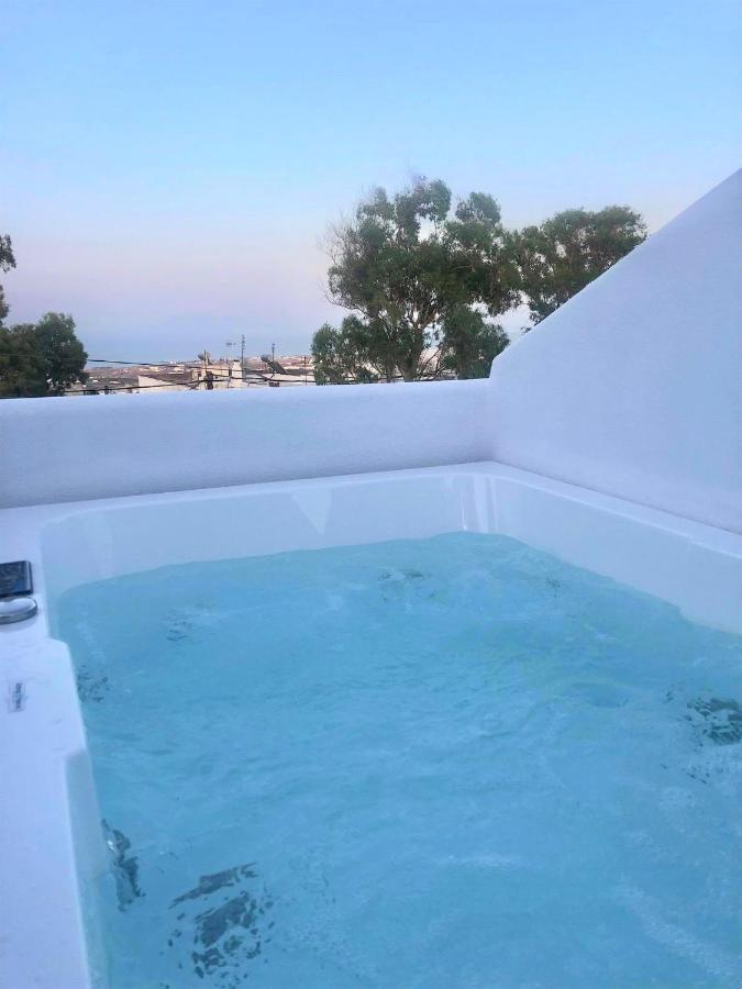 Candele Suites Тира Экстерьер фото